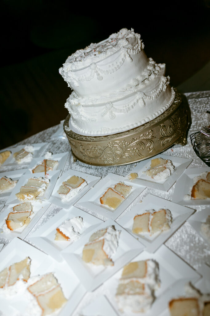 wedding cake cut on table editorial style
